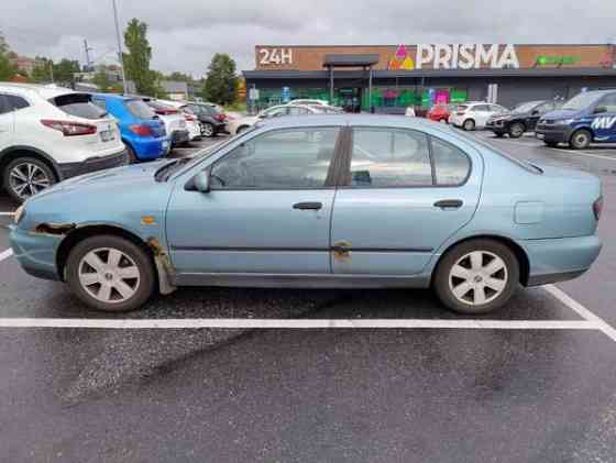 Nissan Primera Turtkul