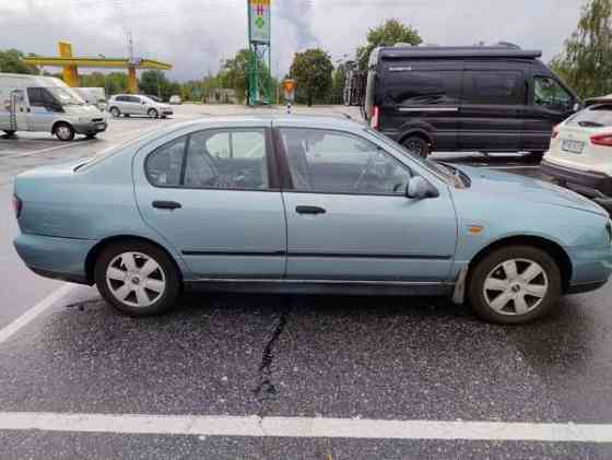 Nissan Primera Turtkul