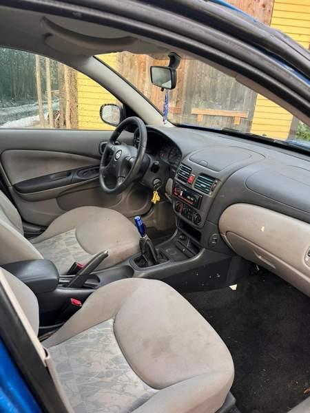 Nissan Almera Kifri - photo 7