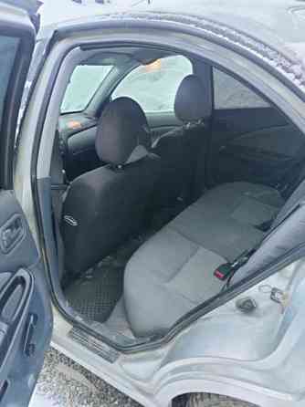 Nissan Almera Kolari