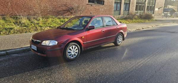 Mazda 323 Turtkul - valokuva 1