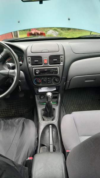 Nissan Almera Viitasaari - photo 6